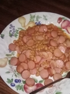 A picture of Dogs and beans with bacon 🥓.