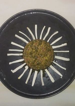 A picture of French beans in peanut gravy.