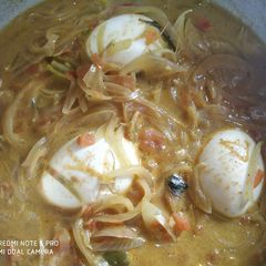 A picture of Kerala Style Egg Curry with Coconut Milk.