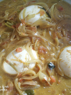 A picture of Kerala Style Egg Curry with Coconut Milk.
