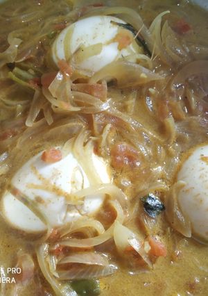 A picture of Kerala Style Egg Curry with Coconut Milk.