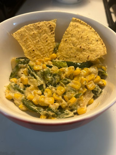 Una foto de ‧₊˚ Rajas con crema, queso y elote ‧₊˚
