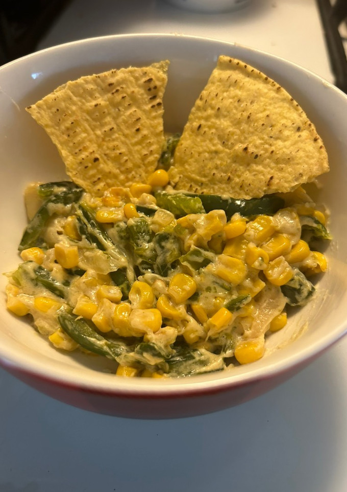 Una foto de ‧₊˚ Rajas con crema, queso y elote ‧₊˚