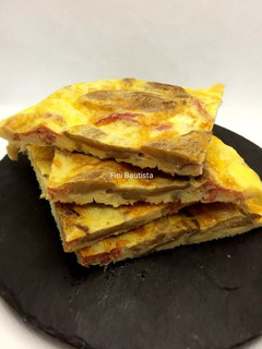 Una foto de Tortilla de setas y jamón serrano