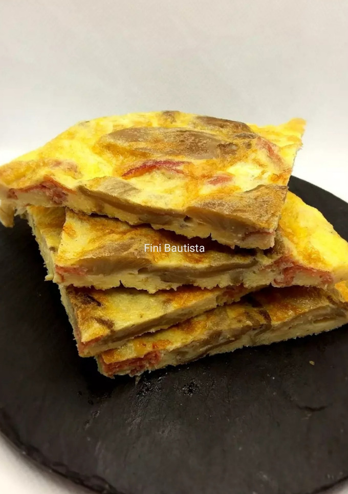 Una foto de Tortilla de setas y jamón serrano