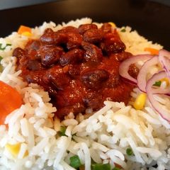 A picture of Njahi with mixed vegetable rice.