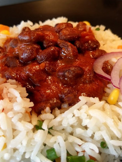 A picture of Njahi with mixed vegetable rice.
