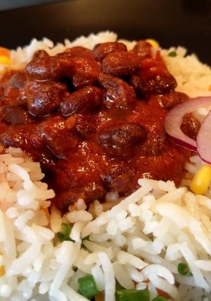 A picture of Njahi with mixed vegetable rice.