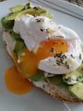 Avocado Toast with Cream Cheese, Poached Egg, and Sliced Almonds