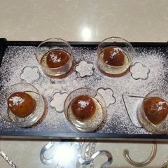A picture of Gulkand filled sweet potato gulab jamun.