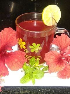 जास्वंदाच्या फुलांचा चहा (jaswandichya fulancha chai recipe in marathi) रेसिपी चे मुख्य फोटो