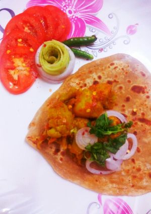 A picture of Aloogobhi with triangle prantha.