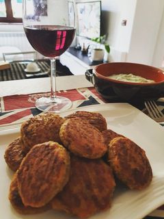 A picture of Lentil Croquettes with Tzatziki Sauce.