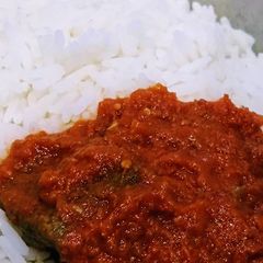 A picture of Boiled rice and stew.