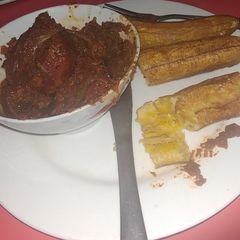 A picture of Fried Banana With Wet Fry Beef Stew.