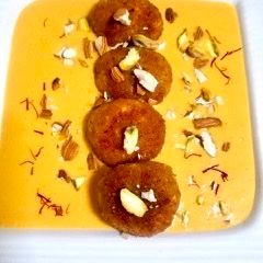 A picture of Paneer balls in Alphonso mango Rabdi.