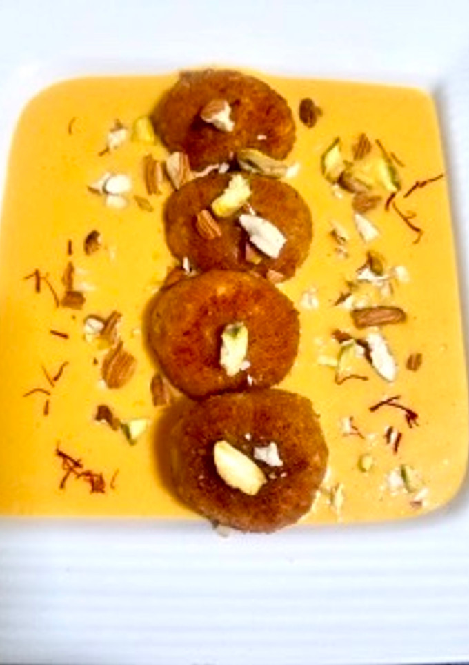 A picture of Paneer balls in Alphonso mango Rabdi.