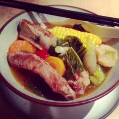 A picture of Pork rib soup with pickled mustard greens.