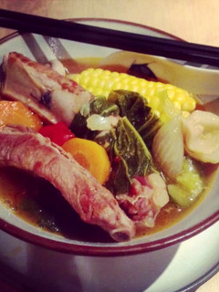 A picture of Pork rib soup with pickled mustard greens.