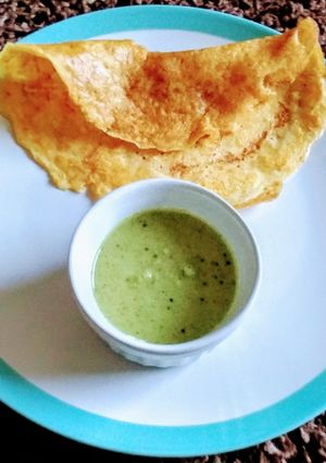 A picture of Orange dosa/Carrot dosa.