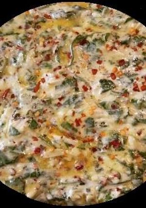 A picture of (#name)  Spinach flavored Indian flat bread.