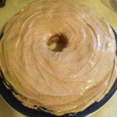 A picture of Apple Pie Cake with Cinnamon-Infused Cream Cheese Icing.