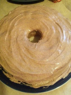 A picture of Apple Pie Cake with Cinnamon-Infused Cream Cheese Icing.