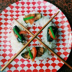 Brinjal sushi with rice A picture of Brinjal sushi with rice.