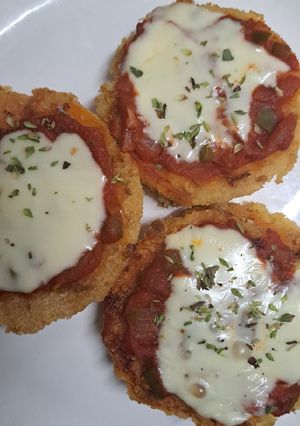 Una foto de Milanesa de calabaza napo 🧀🍅