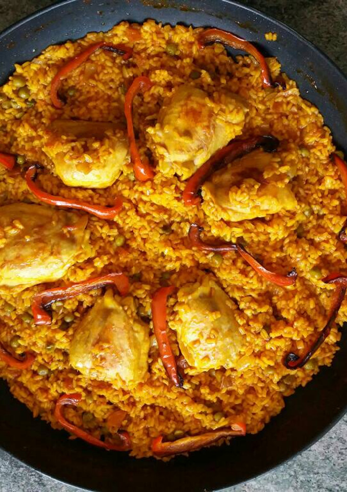 Una foto de Paella de pollo🐔