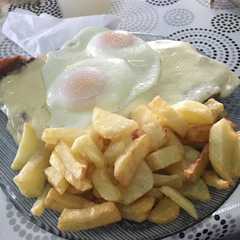 Una foto de Milanesa a caballo completa