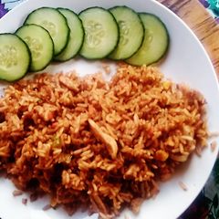 A picture of Fried chicken and rice.