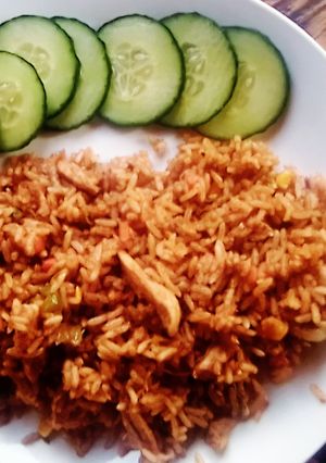 A picture of Fried chicken and rice.