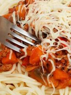 A picture of A delicious Pasta and bolognaise souce.