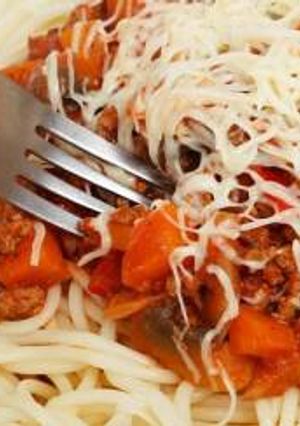 A picture of A delicious Pasta and bolognaise souce.