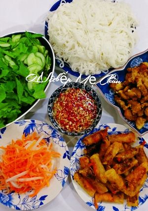 A picture of Bún Thịt Nướng with Bình Định Shrimp Spring Rolls.