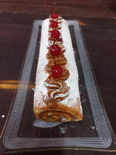 Una foto de Arrollado con dulce de leche