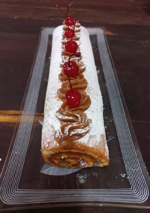 Una foto de Arrollado con dulce de leche