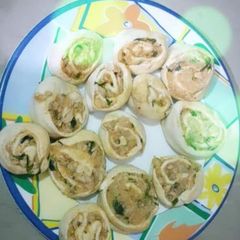 A picture of Chicken and potato pinwheel samosa.