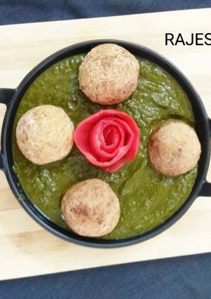 A picture of Cheese Kofta in Spinach Gravy.
