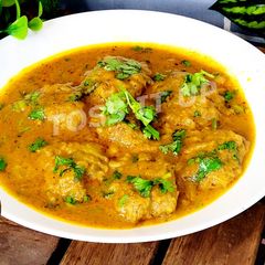A picture of Gravy Wale Zero Oil Steamed Lauki Ke Pakaude Lauki Kofta.