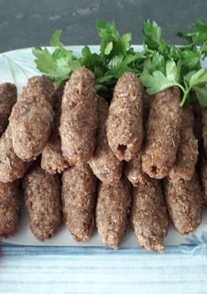 A picture of Kebab with Bulgur.