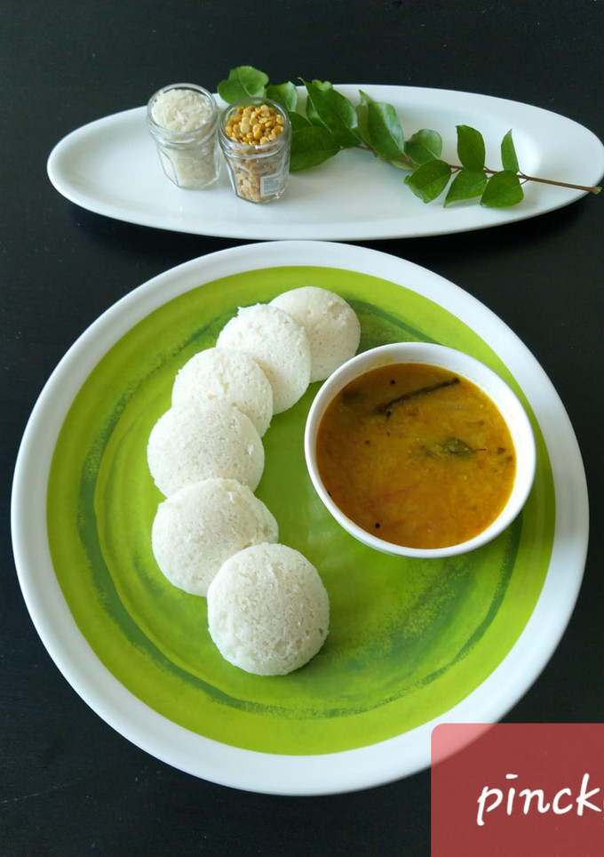 A picture of Idli with sambhar.