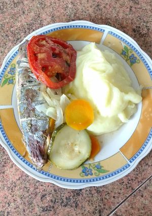 Una foto de Pescado al horno con puré