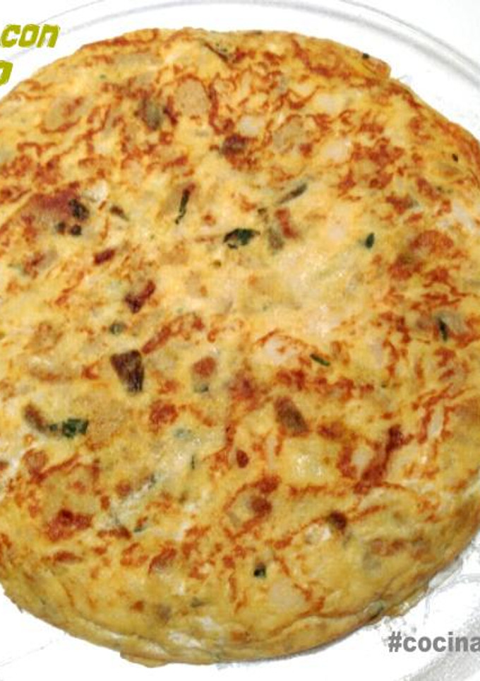 Una foto de Tortilla con migas de Bacalao