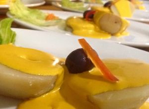 Una foto de Patatas en salsa huancaina