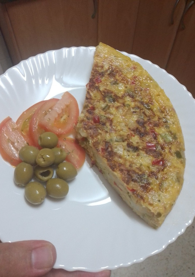 Una foto de Tortilla de papas y pisto