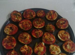 Una foto de Mini pizzas de Berenjena