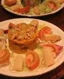 Arroz con surimi, plátano, uvas y nueces