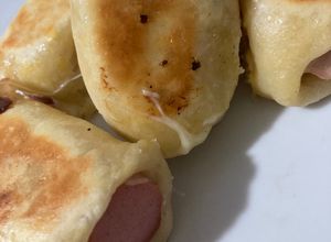 Una foto de Panchos envueltos con masa casera
